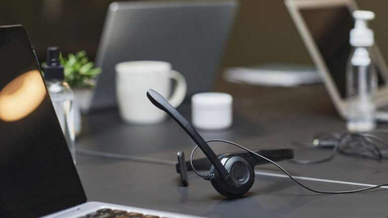 Headset with microphone on a desk for online accent coaching