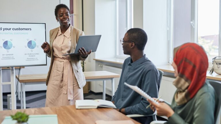 Diverse business professionals in a meeting presentation