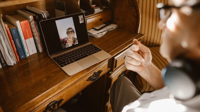 Online 1-on-1 video session on a laptop